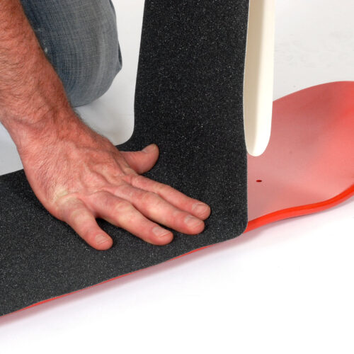 H3422-Skateboard-Grip-Tape-Aerated-Carbide-Being-Applied-to-Skateboard-3.jpg