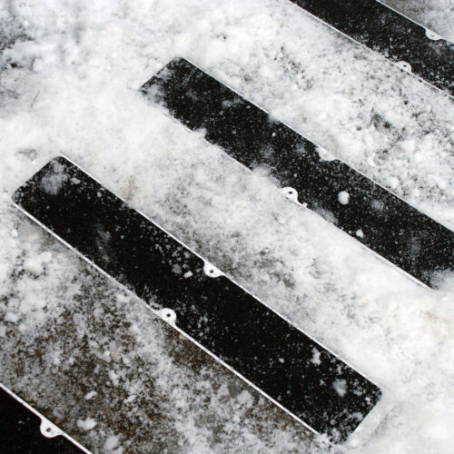 H3409-115mm-x-635mm-Bolt-Down-Anti-Slip-Plate-Providing-a-Safe-Walkway-in-Snow-4.jpg