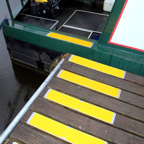 H3409-115mm-x-635mm-Bolt-Down-Anti-Slip-Plate-on-Ribbed-Wooden-Decking-1.jpg