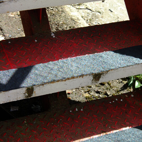 H3406N-Black-Conformable-Safety-Grip-100mm-Applied-to-Stairs-3-1.jpg